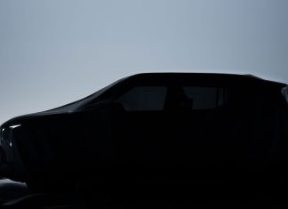 Kia announced the imminent premiere of a new model: what kind of car is hidden under the black cloth?